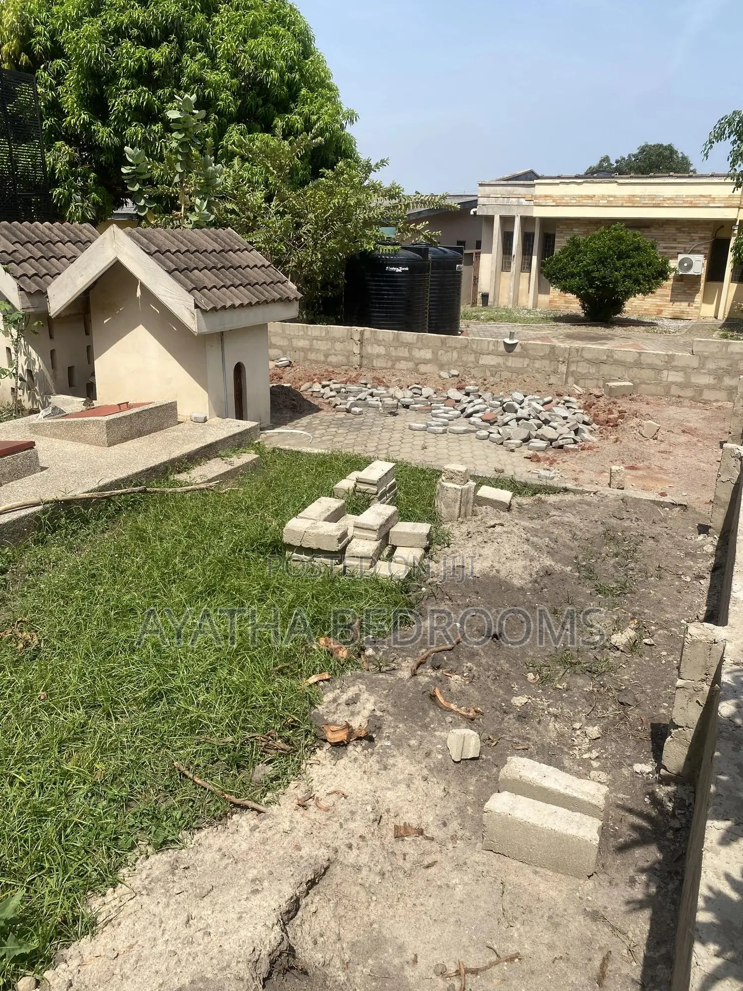 Half Plot of Land for Sale at Teshei Greda Estate