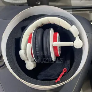 White Headset_ Cranium Audio Interface Device_ Hurtz