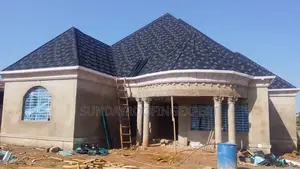 Shingle and PVC Gutter Installation