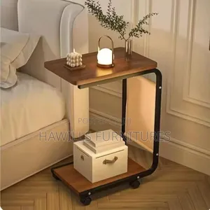Sofa Side Table Featuring a Dark Wood Finish.