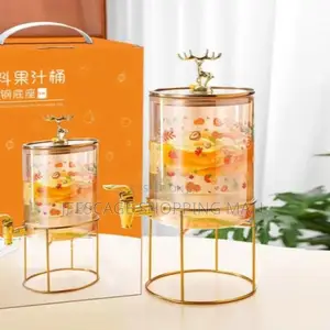 Elegant Glass Beverage Dispenser With Golden Deer Finial and Stand