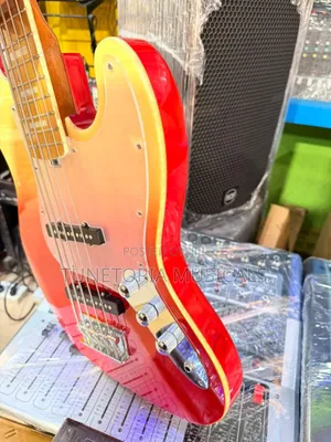 Fender Sqoe 5-String Electric Bass Guitar With a Sunrise Fade Finish.