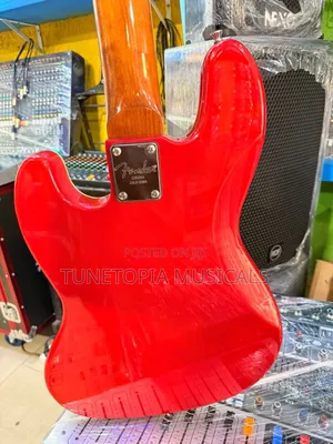 Fender Sqoe 5-String Electric Bass Guitar With a Sunrise Fade Finish.