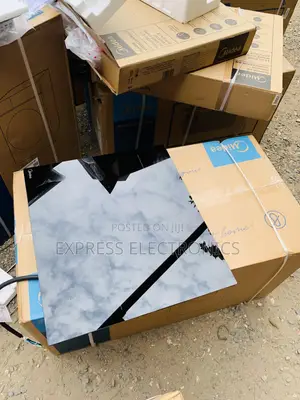 Newly Sealed in Bi. Midea Bulky 4burger Electric And