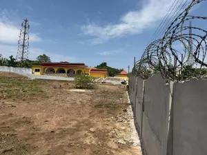 Walled and Gated 125/100sqft Land