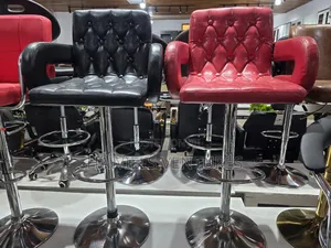 Adjustable Swivel Bar Stool With Tufted Leather.