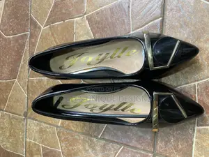 Onyx Elegance Kitten Heel Pumps