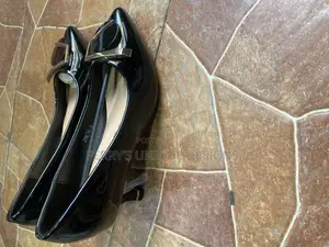 Onyx Elegance Kitten Heel Pumps