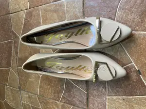 Ivory Elegance Kitten Heel Pumps