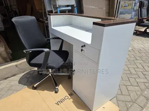 Modern Receptionist Desk Features a White Body and Dark Walnut Panels