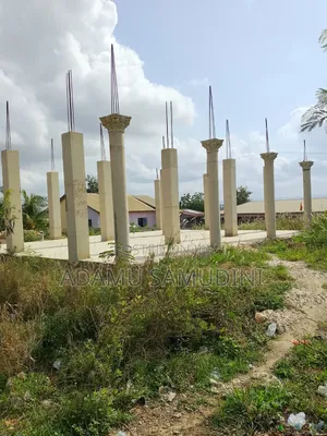 Road Side Land With 3shops Footen N Pillar Structures for Cool Price