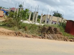 Road Side Land With 3shops Footen N Pillar Structures for Cool Price