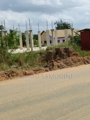Road Side Land With 3shops Footen N Pillar Structures for Cool Price