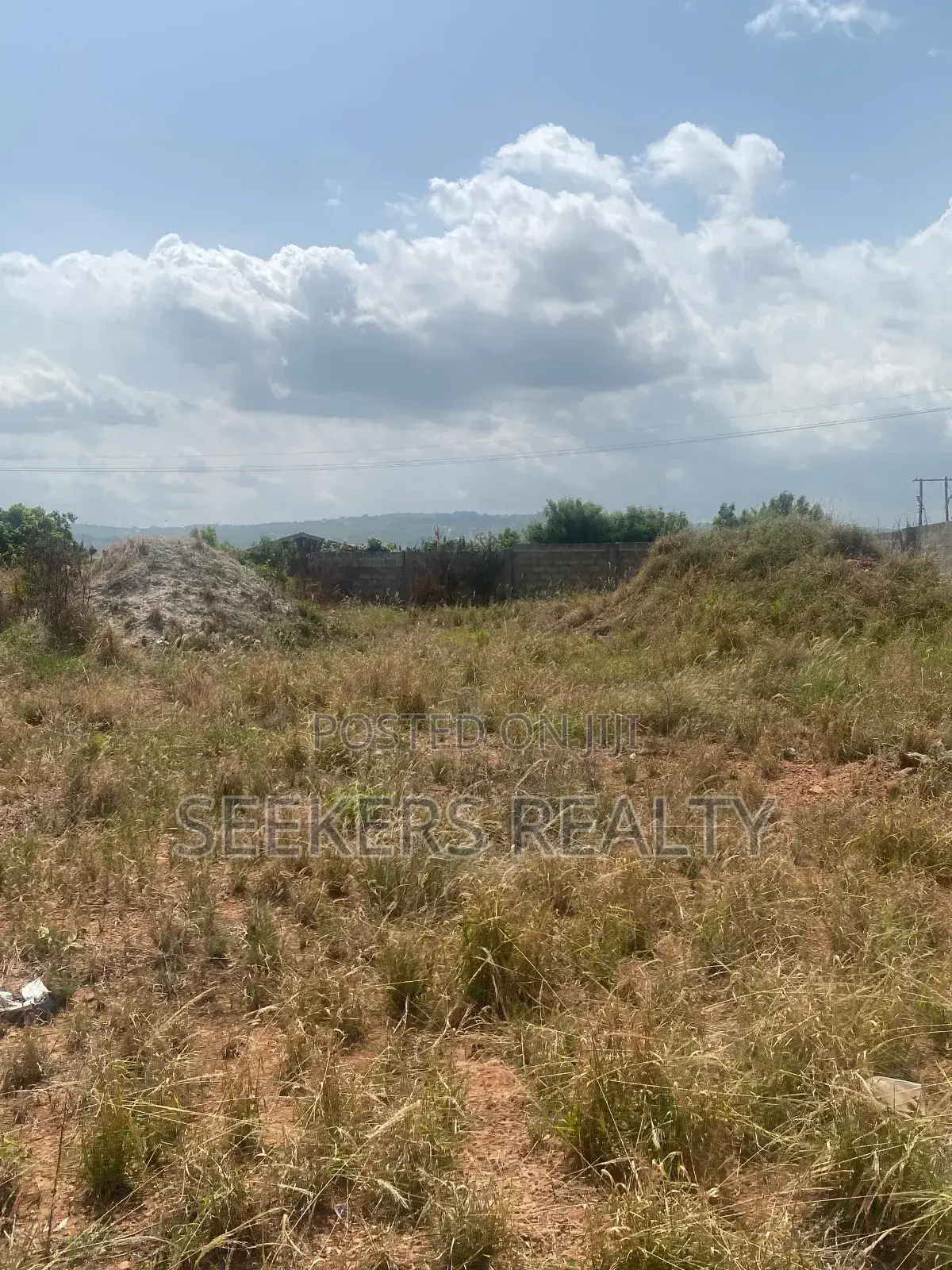 Roadside Land Walled and Gated 3 Plots of Land