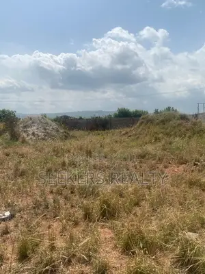 Roadside Land Walled and Gated 3 Plots of Land