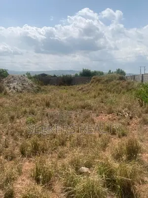 Roadside Land Walled and Gated 3 Plots of Land