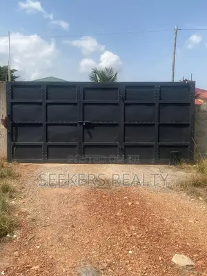Roadside Land Walled and Gated 3 Plots of Land