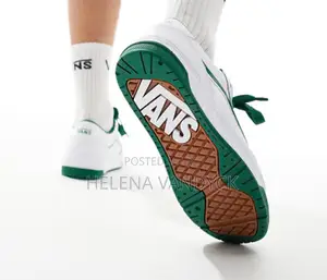 Vans Hylane Chunky Leather Sneakers in a White and Pop Green Colorway.