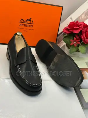 Hermès Black Leather Penny Loafers