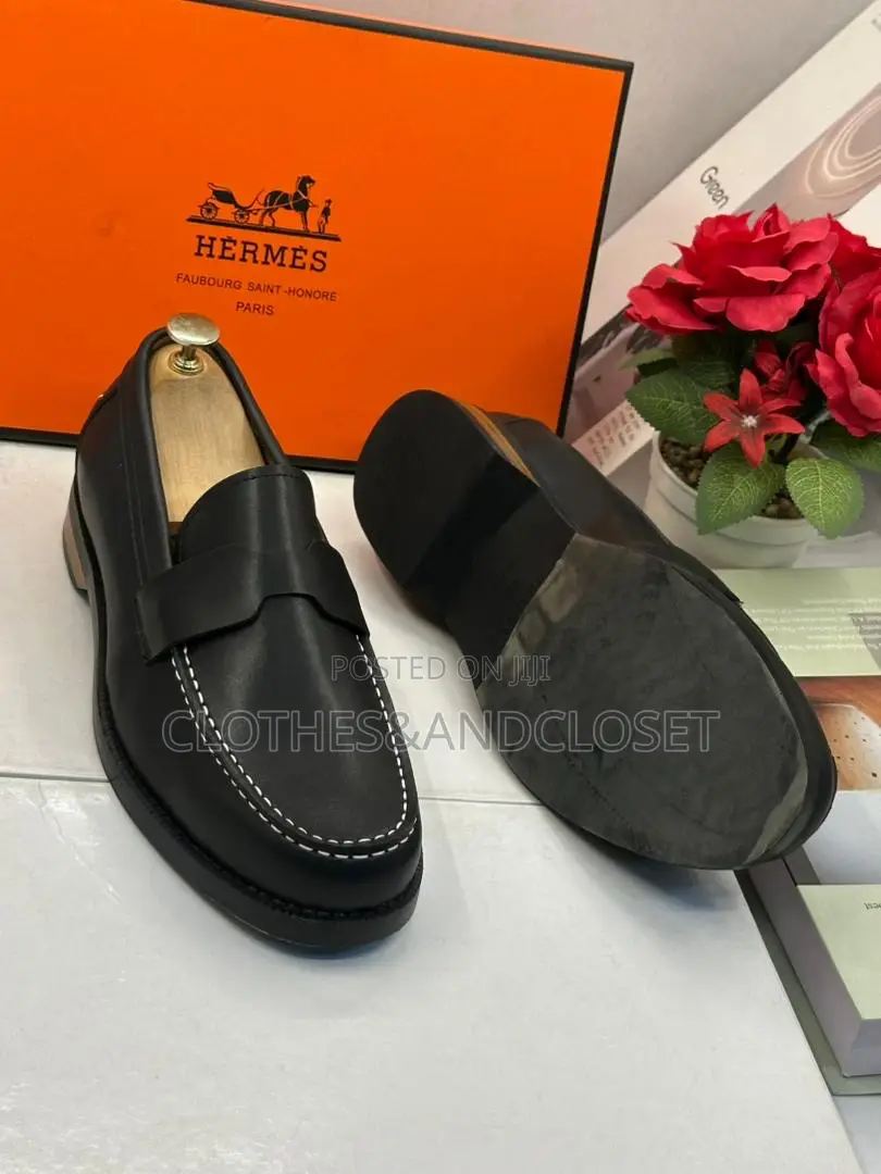 Hermès Black Leather Penny Loafers