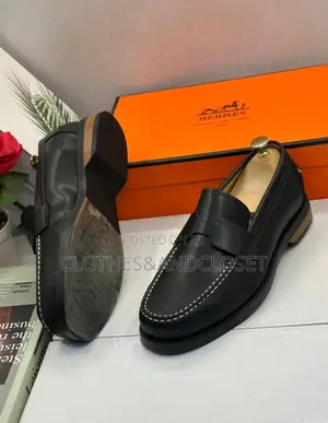 Hermès Black Leather Penny Loafers