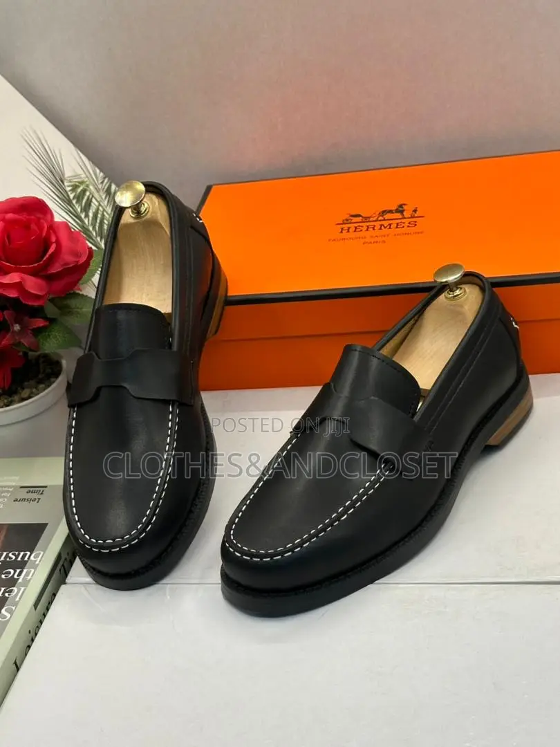 Hermès Black Leather Penny Loafers