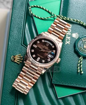 Rolex Day-date 36 In Everose Gold