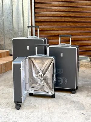 Hard-Shell Aluminum Trolley Suitcases Available as a Three-Piece Set.
