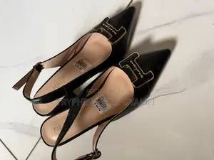 Brand New Classic Black Slicked Back Shoe for Ladies