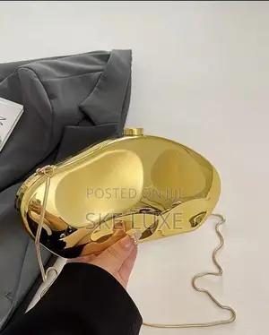 Luxury Metallic Sculpted Clutch Bag