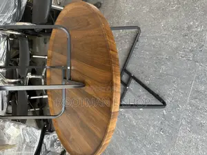Modern Round Wooden Side Table With a Dark Finish Sleek Metal Frame