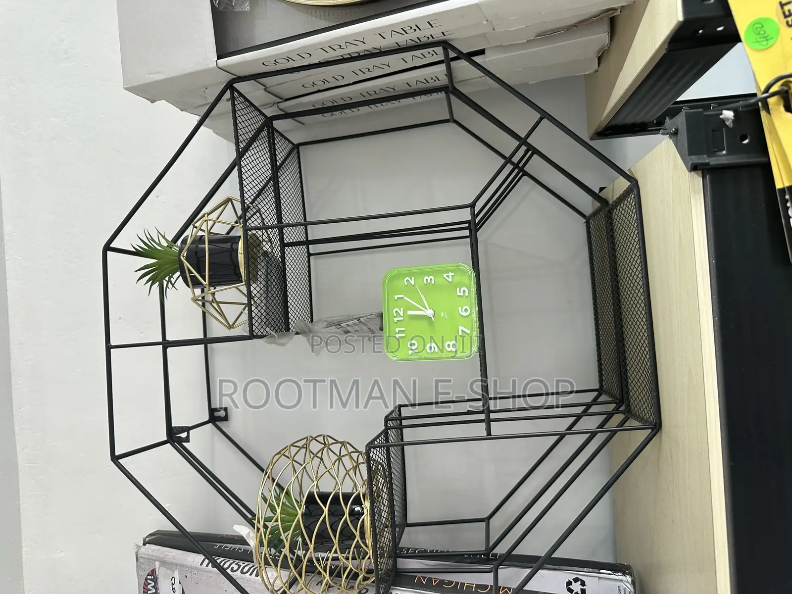 Gold-Colored Geometric Wire Planters Containing Artificial Succulent