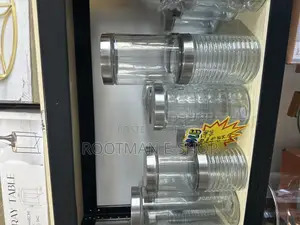 Clear Glass Food Storage Canisters Featuring Silver-Colored Metal Lids