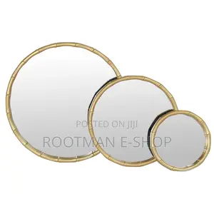 Modern Round Wall Mirrors Featuring a Gold Metal Frame