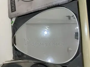 Silver Frame Pebble Mirror Tear Drop Shape Abstract Wall Mirror 60cm