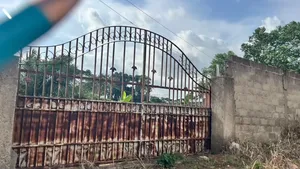 14 Plots Fully Documented Walled Gated Property at Aburi