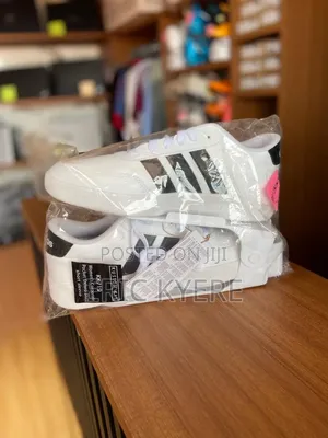 Adidas White Casual Sneakers With Black Stripes