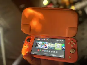 Nintendo Switch Lite 32 Gig +128 Gig With 9 Games