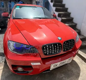 BMW X6 xDrive35i 4x4 Coupe (3.0L 6cyl 8A) 2013 Orange