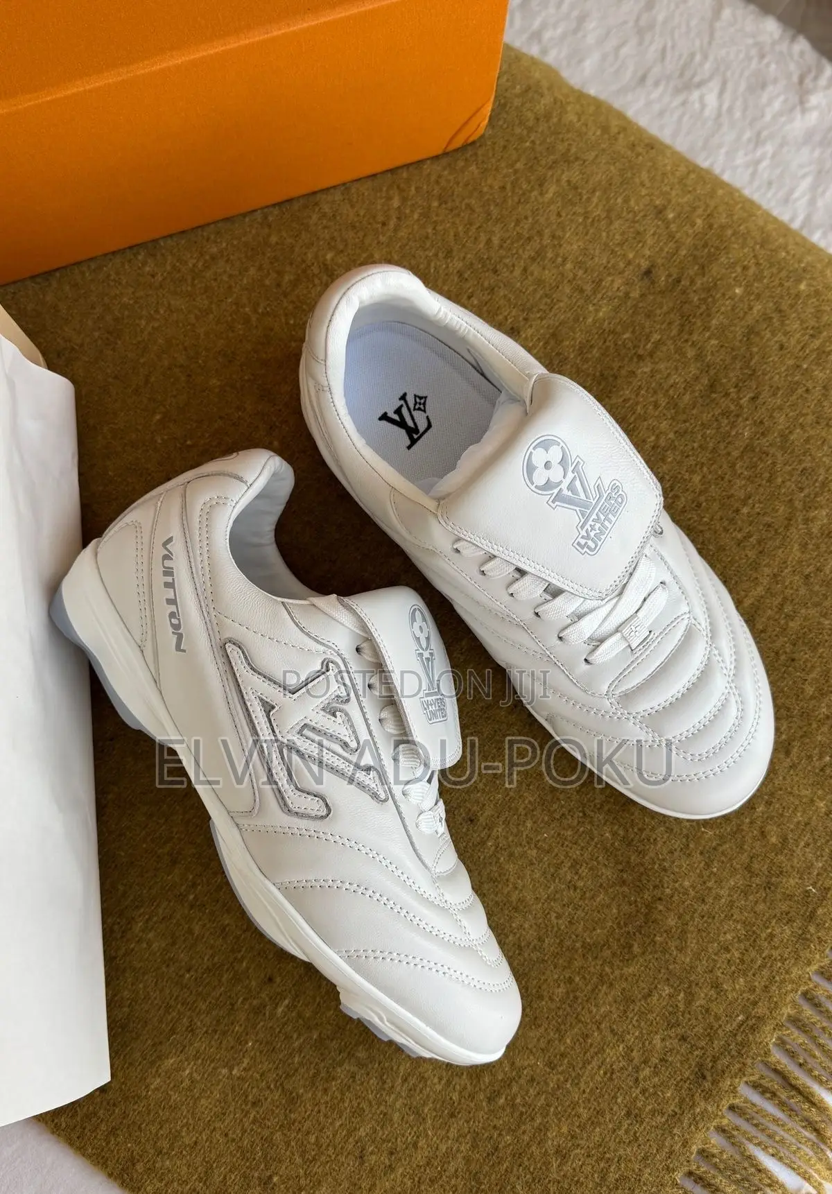 Louis Vuitton Foot-Print Sneaker, Swipe > 