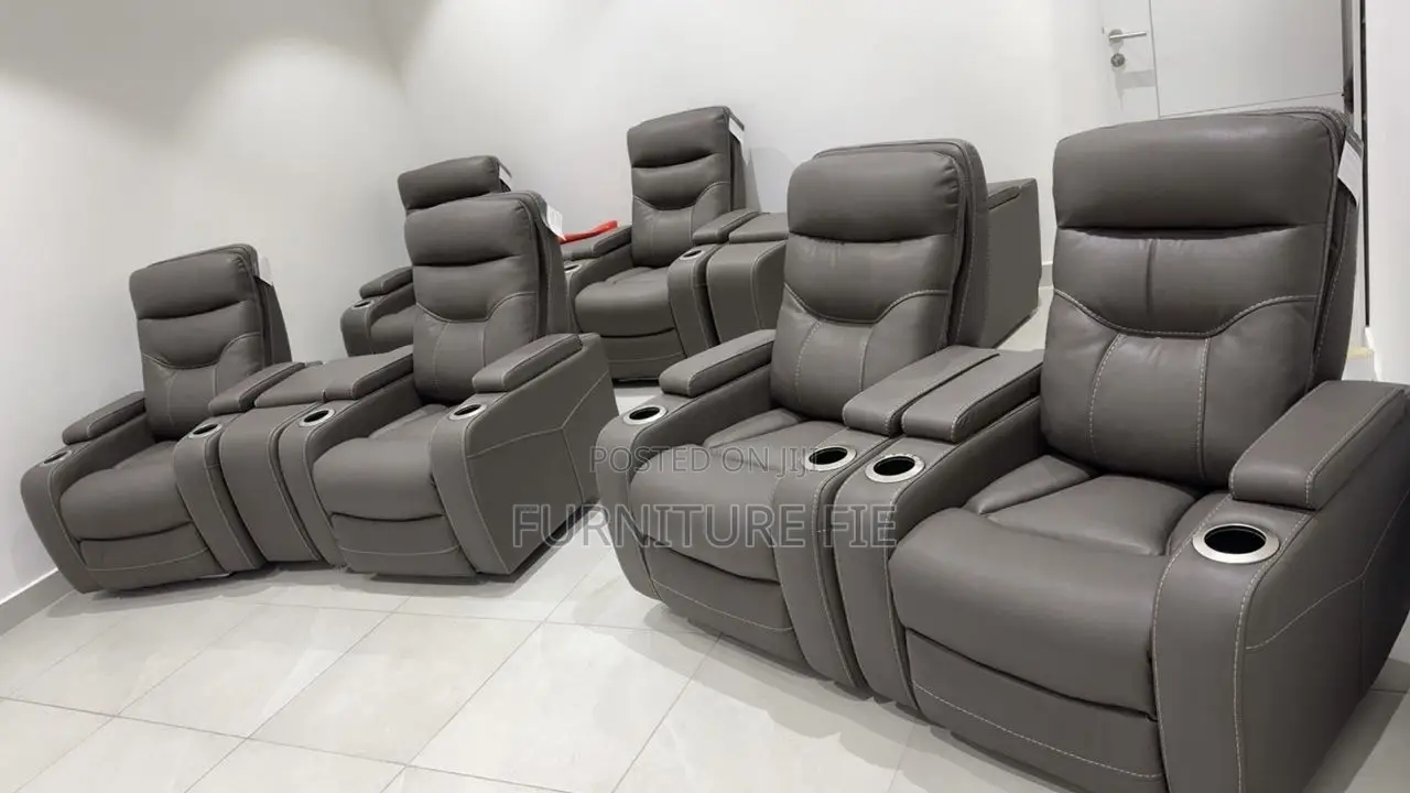 Jabarr 7-Pc. Beyond Leather Theater Seating With 3 Consoles