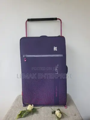 It Luggage Vitalize 2-Wheel Softshell Suitcase. Purple Gradient Design