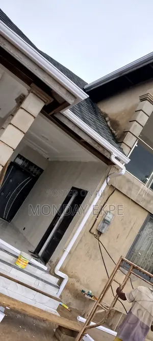 White PVC Gutter and Installation