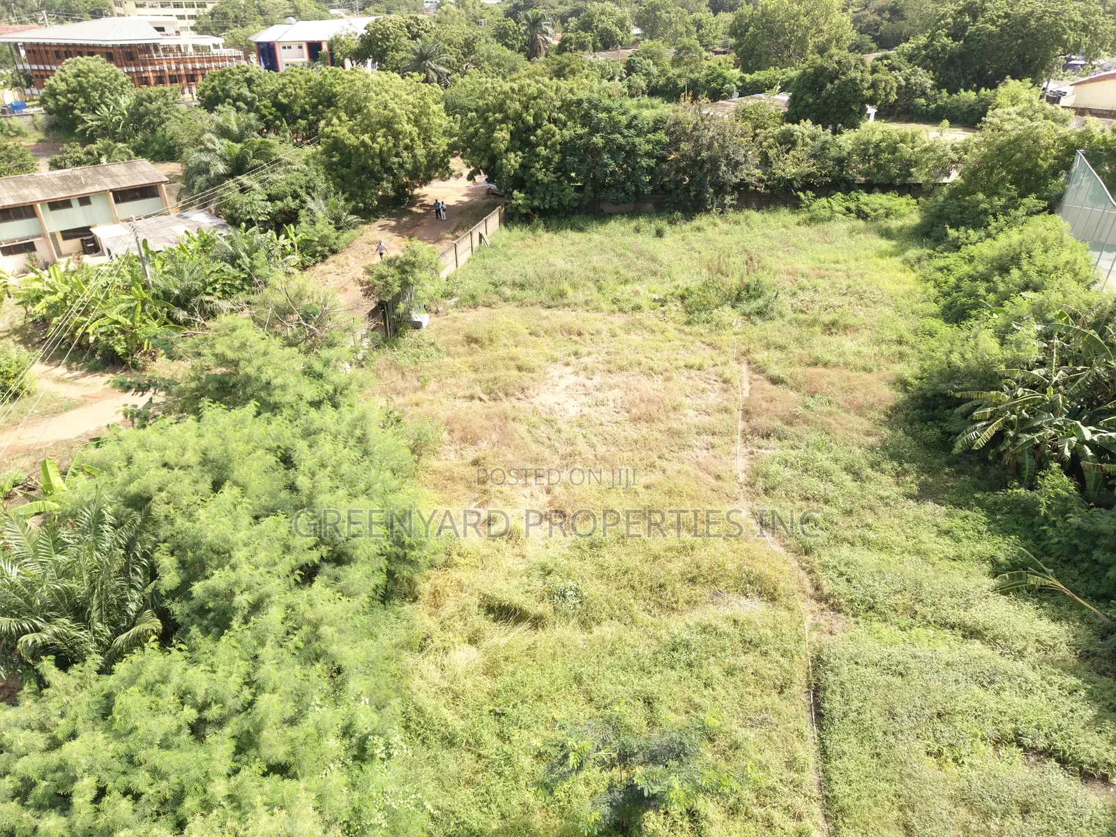 Titled Acre Airport Residential for Sale