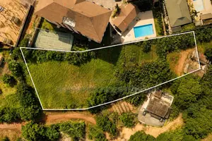 Titled Acre Airport Residential for Sale