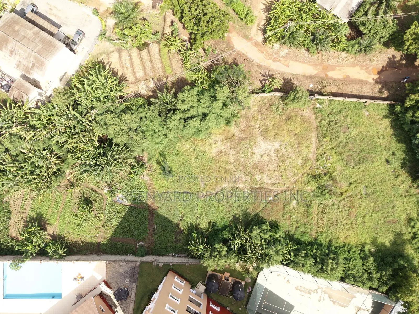 Titled Acre Airport Residential for Sale