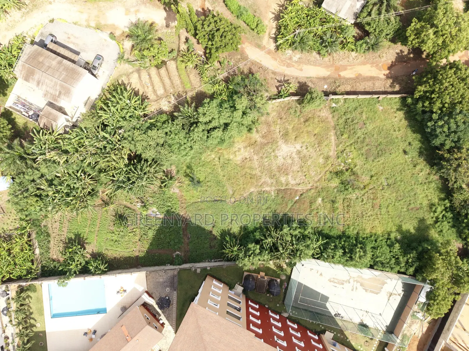 Titled Acre Airport Residential for Sale