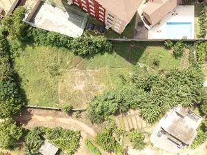 Titled Acre Airport Residential for Sale