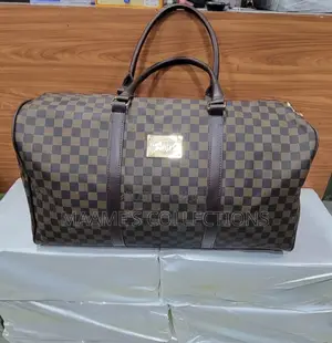 Louis Vuitton Keepall Bandoulière Duffle Bag.
