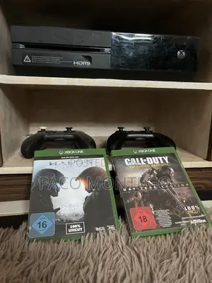 Xbox One 1 With Two Controllers and 6 Games